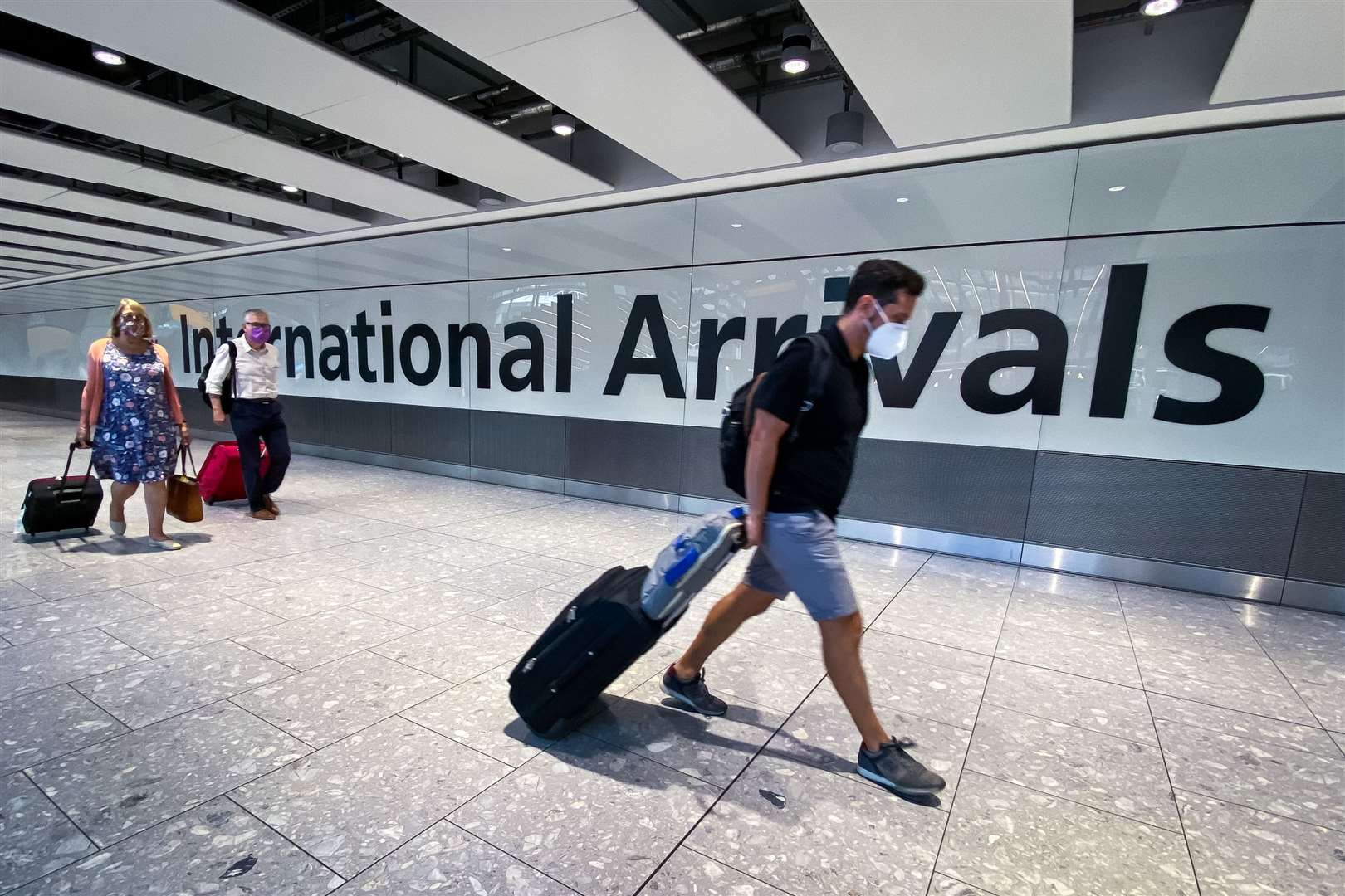 Arrivals at Heathrow Airport (Aarown Chown/PA)