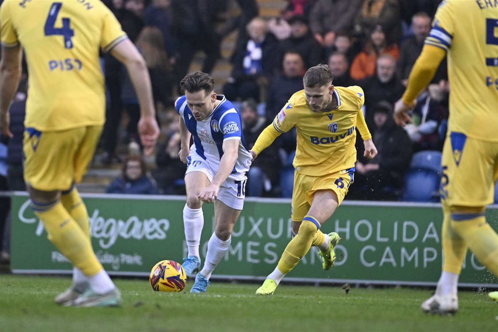 Ethan Coleman chases down Jack Payne as Gillingham played Colchester on Boxing Day Picture: Barry Goodwin