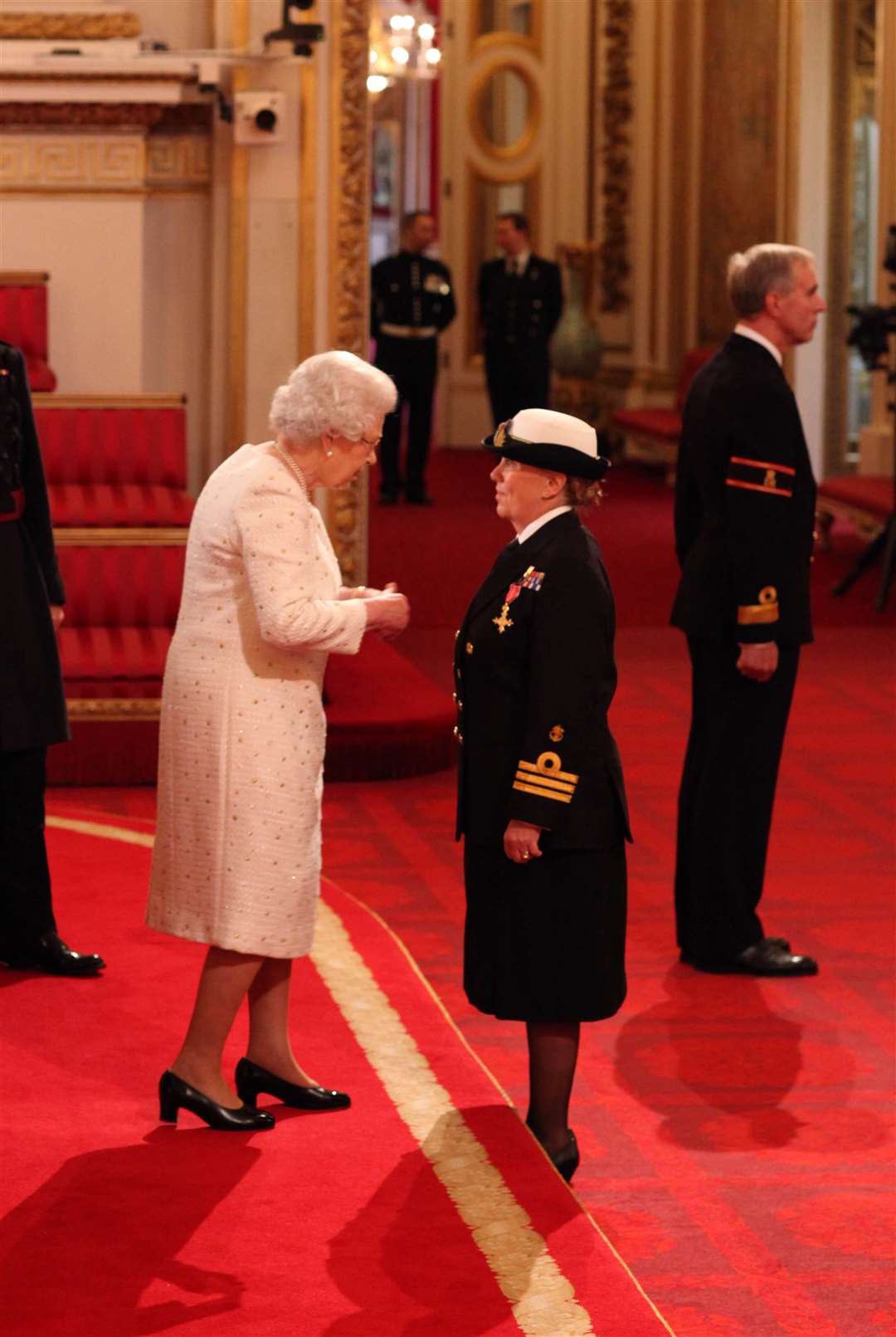 Commander Carol Betteridge received her OBE for services in Afghanistan from the Queen at Buckingham Palace in 2012 (Lewis Whyld/PA)