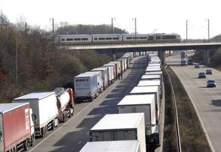 Freight traffic queues on the approach to junction 9 at Ashford on Wednesday. Picture: GARY BROWNE