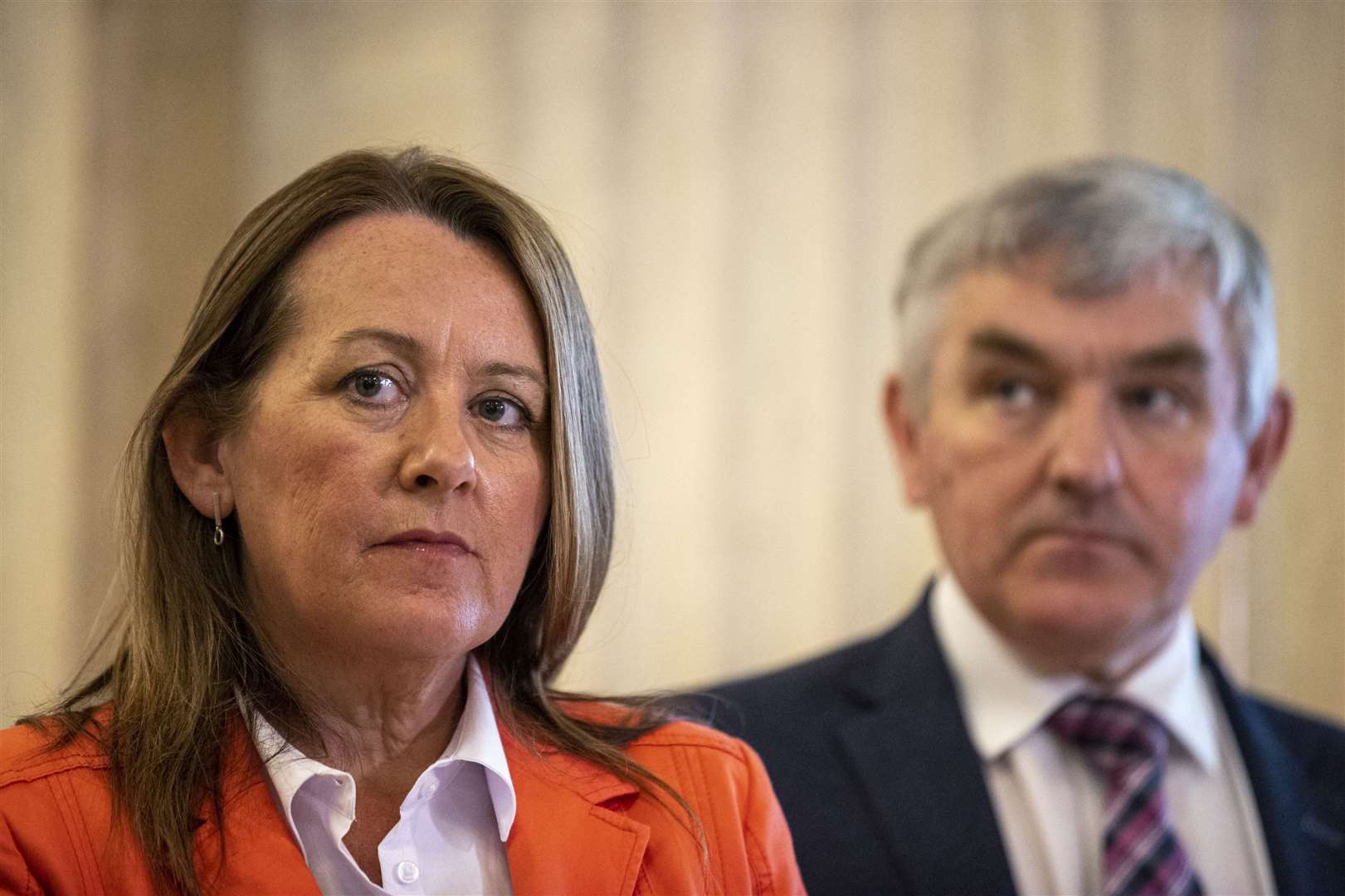 DUP deputy leader Paula Bradley and Thomas Buchanan listen as party leader Edwin Poots announces his Stormont appointments (Liam McBurney/PA)