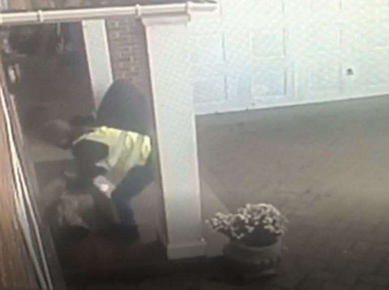 The thieving driver was caught on the homeowner's CCTV