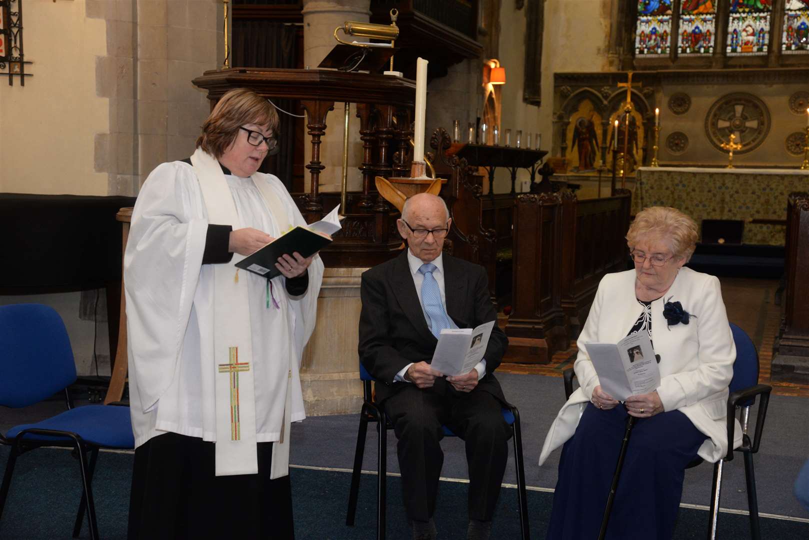 The Rev Lesley Jones with Bill and Jean Ashworth during the service at which they renewed their wedding vows at St Michael's Church, Sittingbourne on Thursday. Picture: Chris Davey. (31975251)