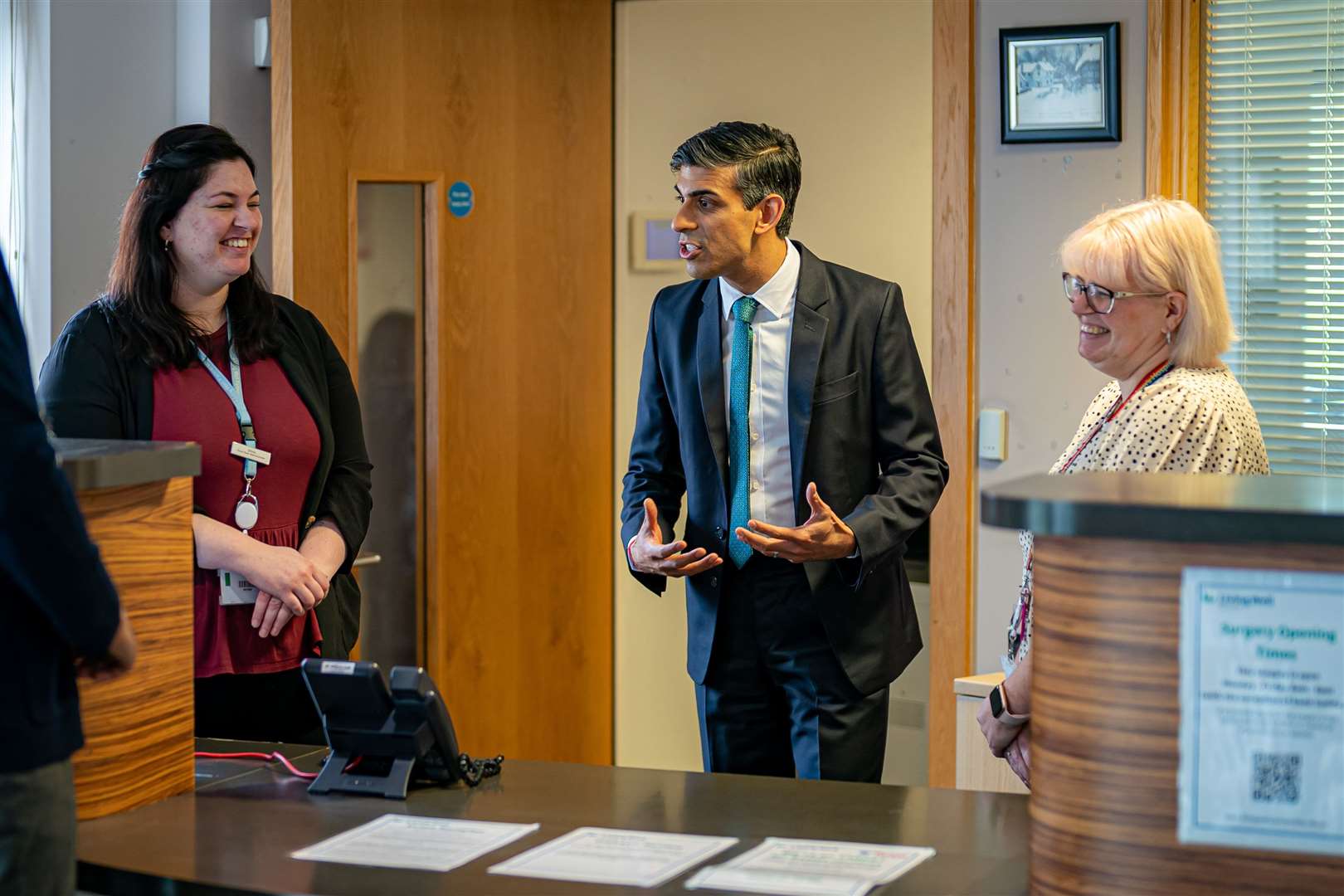 Rishi Sunak meet reception staff during a visit to a GP surgery and pharmacy in Weston, Southampton (Ben Birchall/PA)