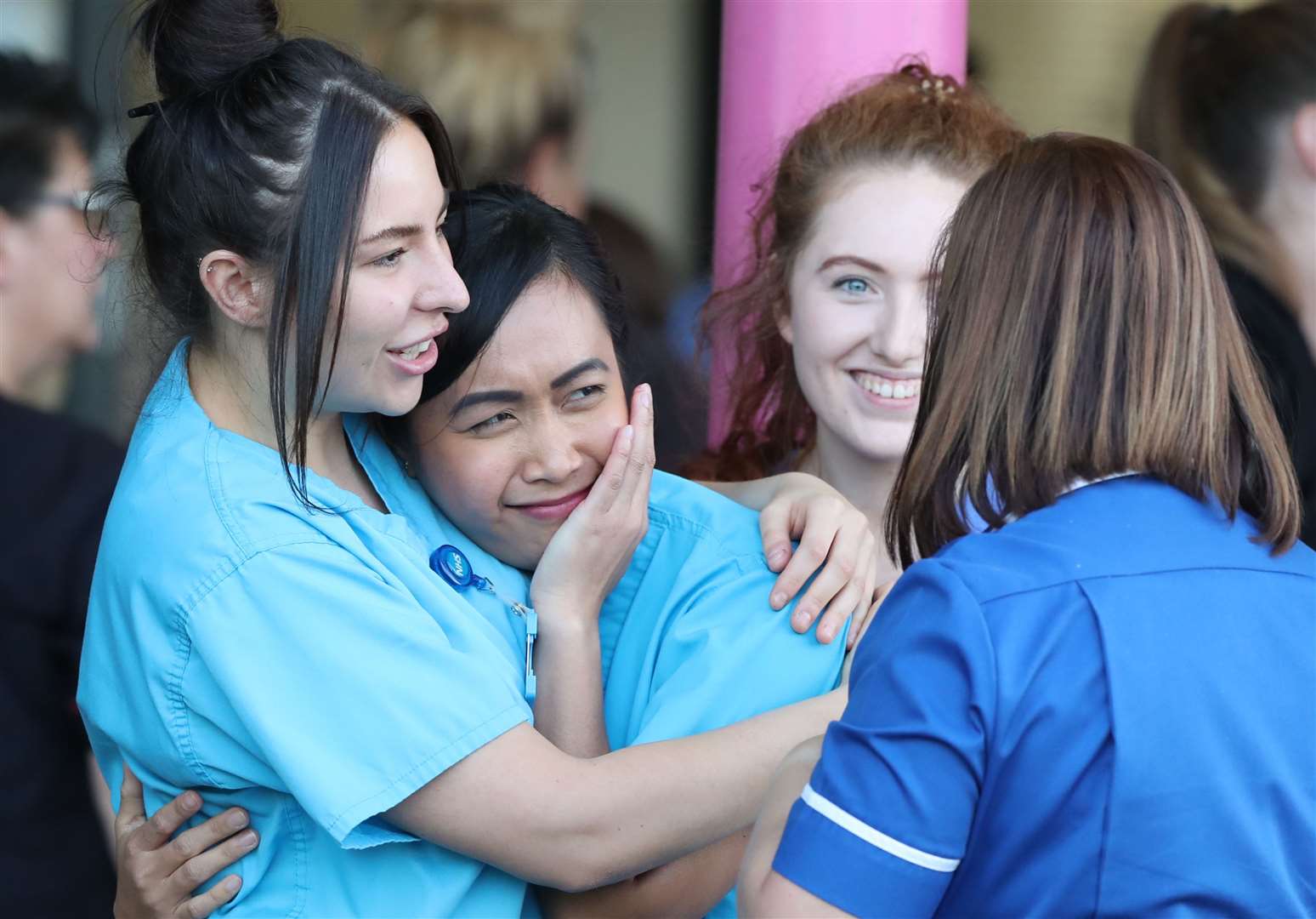 NHS staff from Aintree University Hospital in Liverpool react during the applause (Peter Byrne/PA)