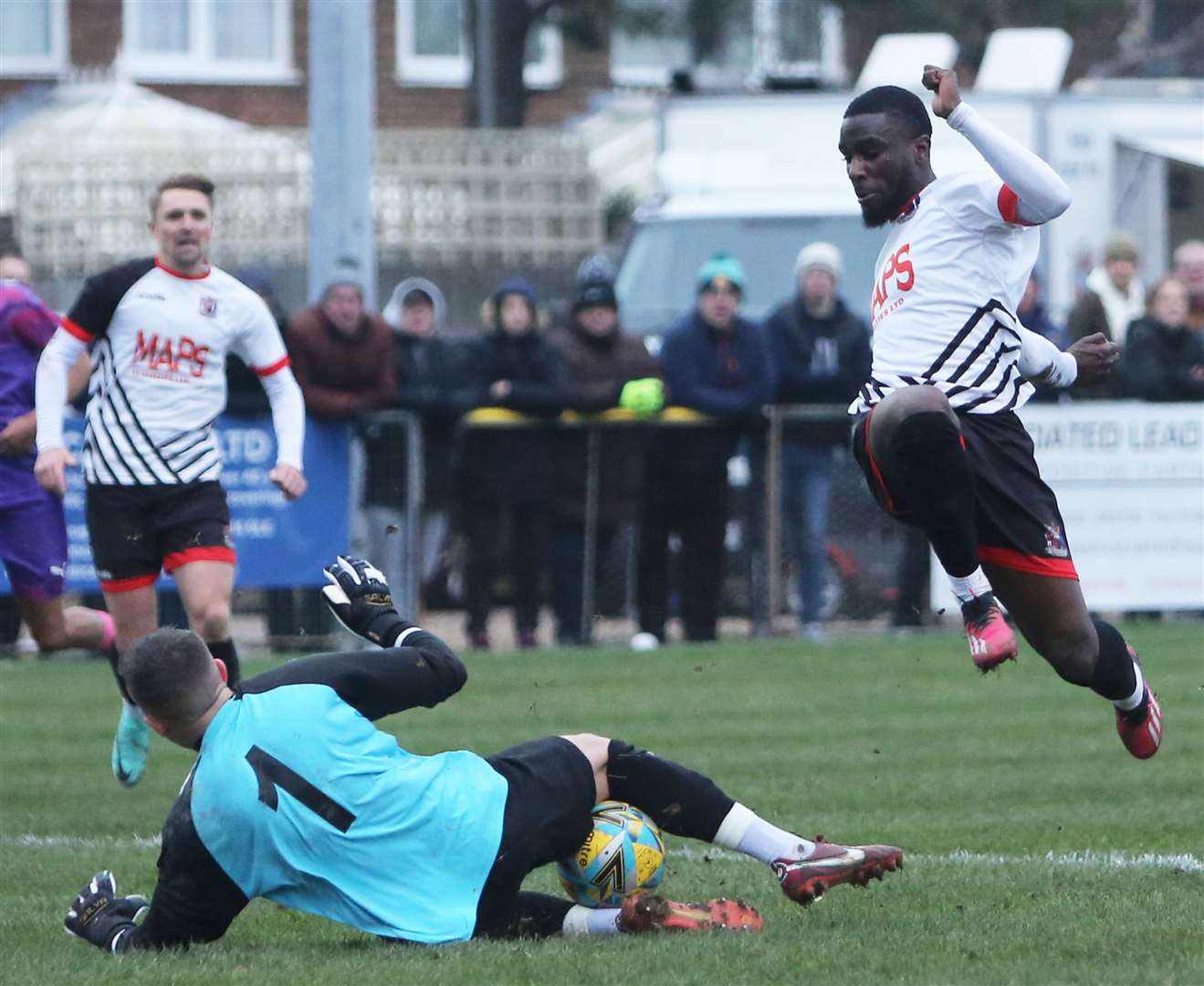 Cobham goalkeeper Rourke Pickford denies Deal right-back Ife Oni. Picture: Paul Willmott