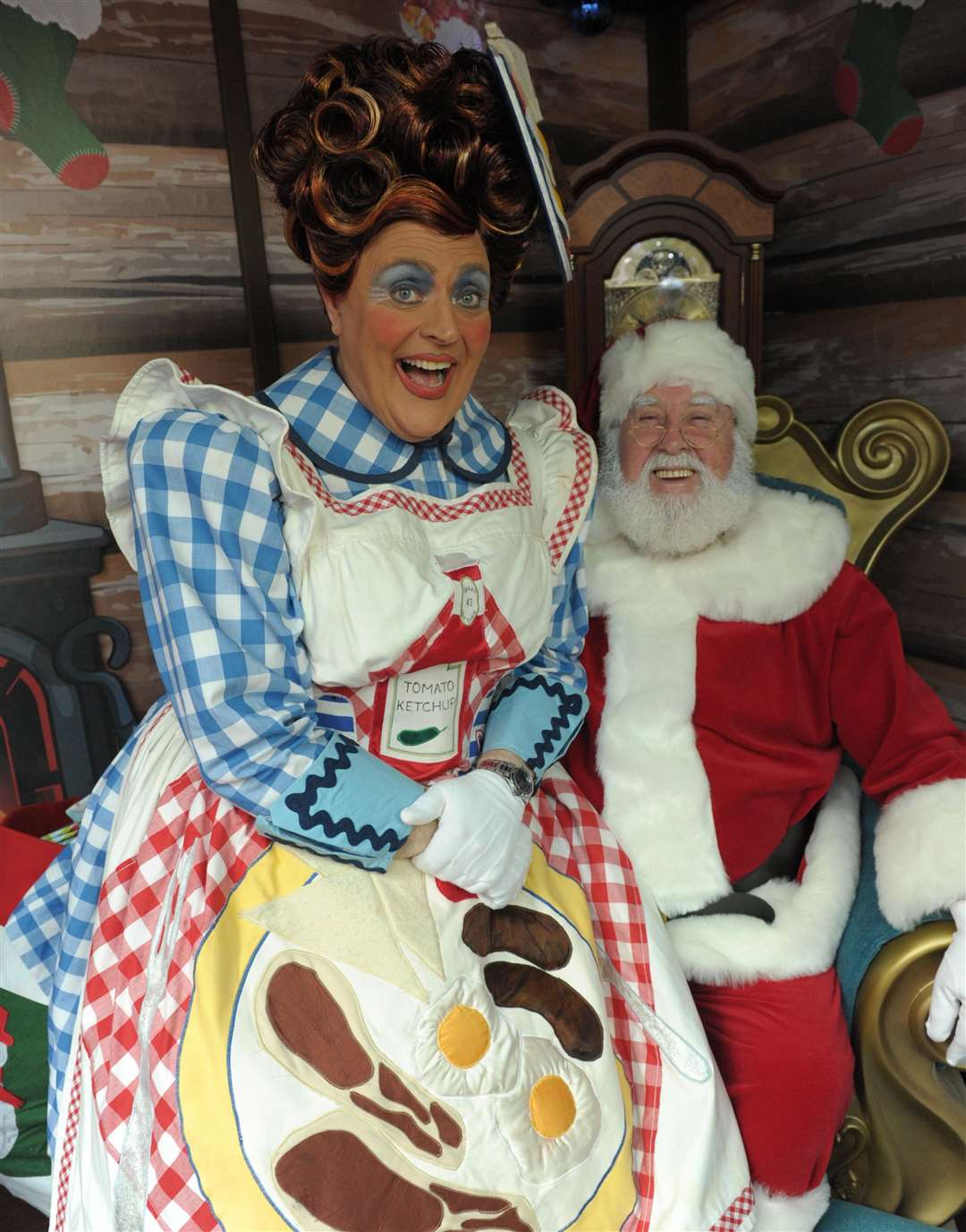 Hempstead Valley Shopping Centre's grotto - panto dame Ian Good meets Santa Picture: Steve Crispe