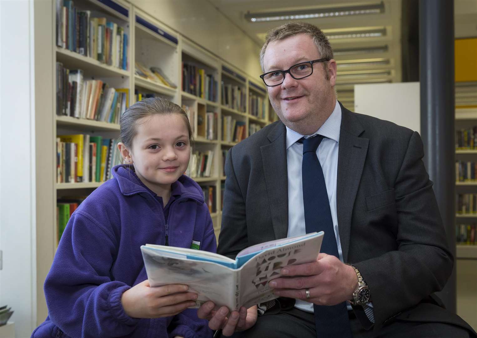 Demi Sampson of Canterbury Primary School and Mark Instance of Tribeca Technology Group at the launch of the Kent Literacy Awards. (1527159)