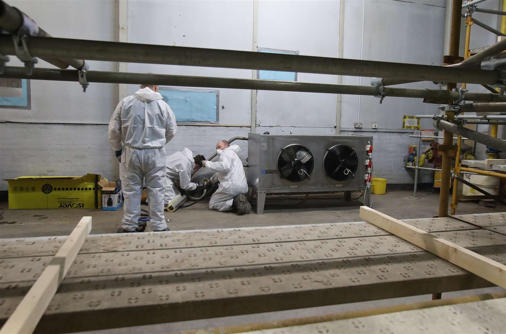 Refrigeration units are installed within the temporary mortuary, which was previously an NHS warehouse (Andrew Milligan/PA)