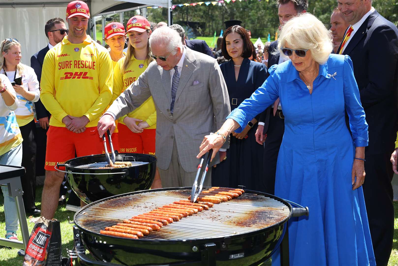 The King and Queen at the Sydney ‘sausage sizzle’ (Toby Mellville/PA)