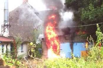 Firefighters tackle a blaze at a paint store in Milton Regis. Picture: Luke Bartlett via @Kent_999s