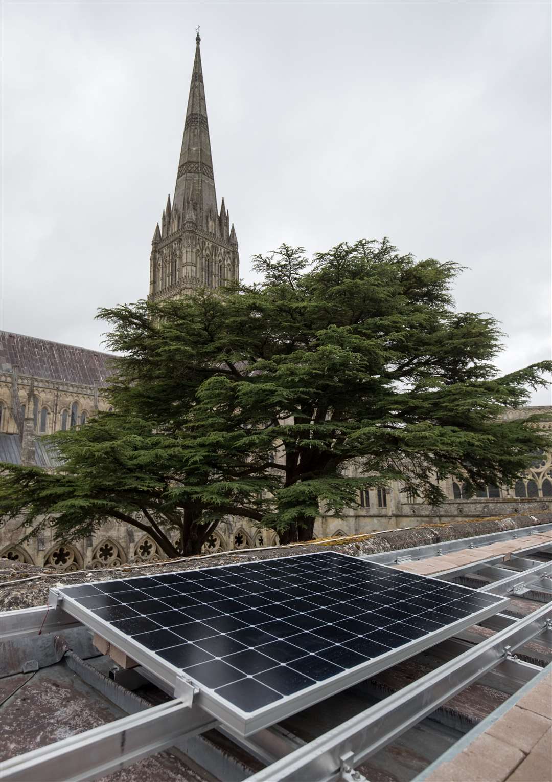 A solar panel is installed on the roof of Salisbury Cathedral’s south cloister, (Andrew Matthews/PA)