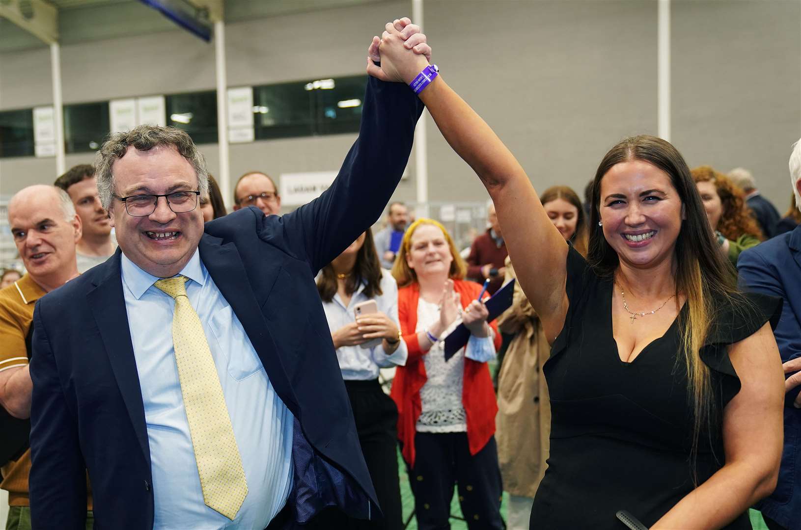 Alliance Party’s Sorcha Eastwood celebrates with MP Stephen Farry (Niall Carson/PA)