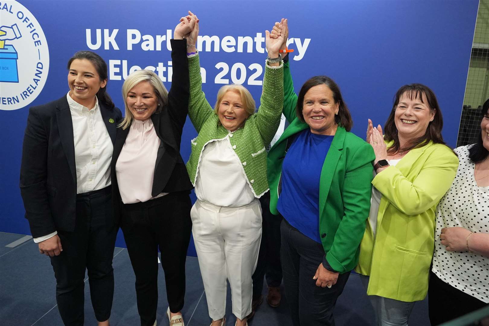 Sinn Fein’s Pat Cullen celebrates with Sinn Fein’s Vice President Michelle O’Neill (second left and Sinn Fein President Mary Lou McDonald (second right) after winning the Fermanagh and South Tyrone constituency (Niall Carson/PA).