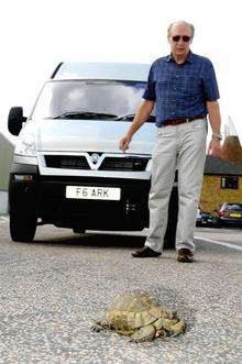 Barry Ash with a Tortoise he found while driving on the M26