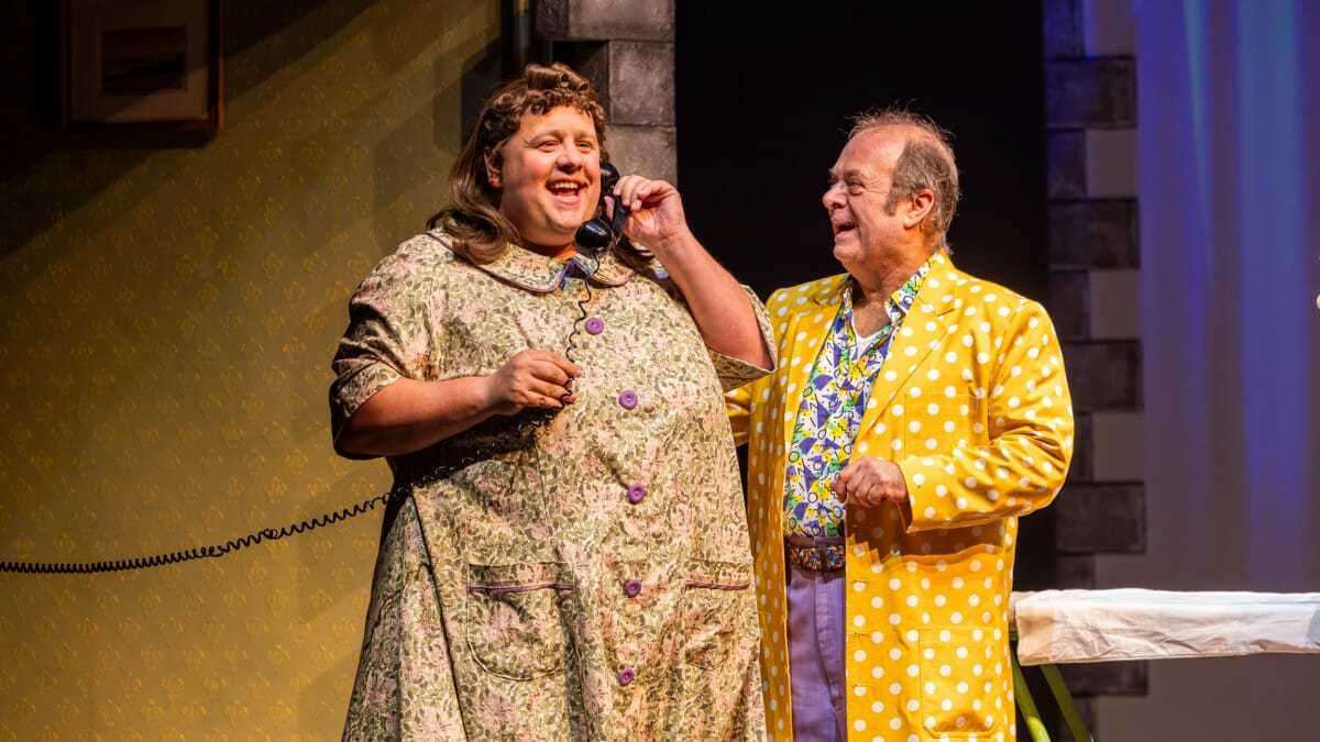 Neil Hurst plays Edna Turnblad, Tracy’s mother, alongside Dermot Canavan as her husband, Wilbur. Picture: Ellie Kurttz