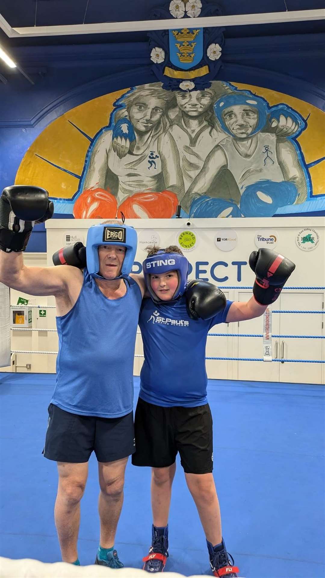 Richard Longthorp in the boxing ring with his grandson, also named Richard (St Paul’s Boxing Academy/PA)