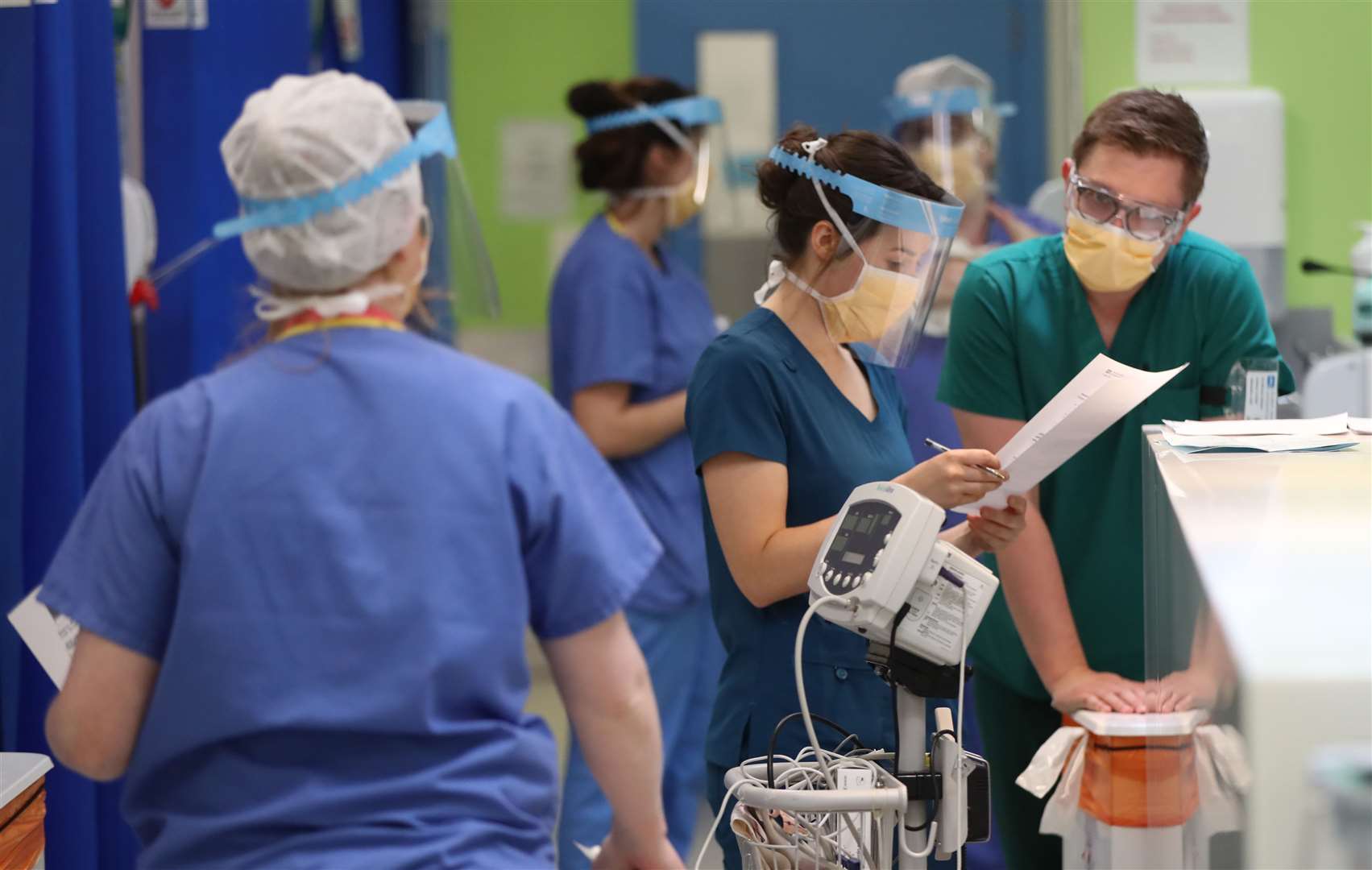 Medical staff at Craigavon Area Hospital at the height of the pandemic in May (Niall Carson/PA)