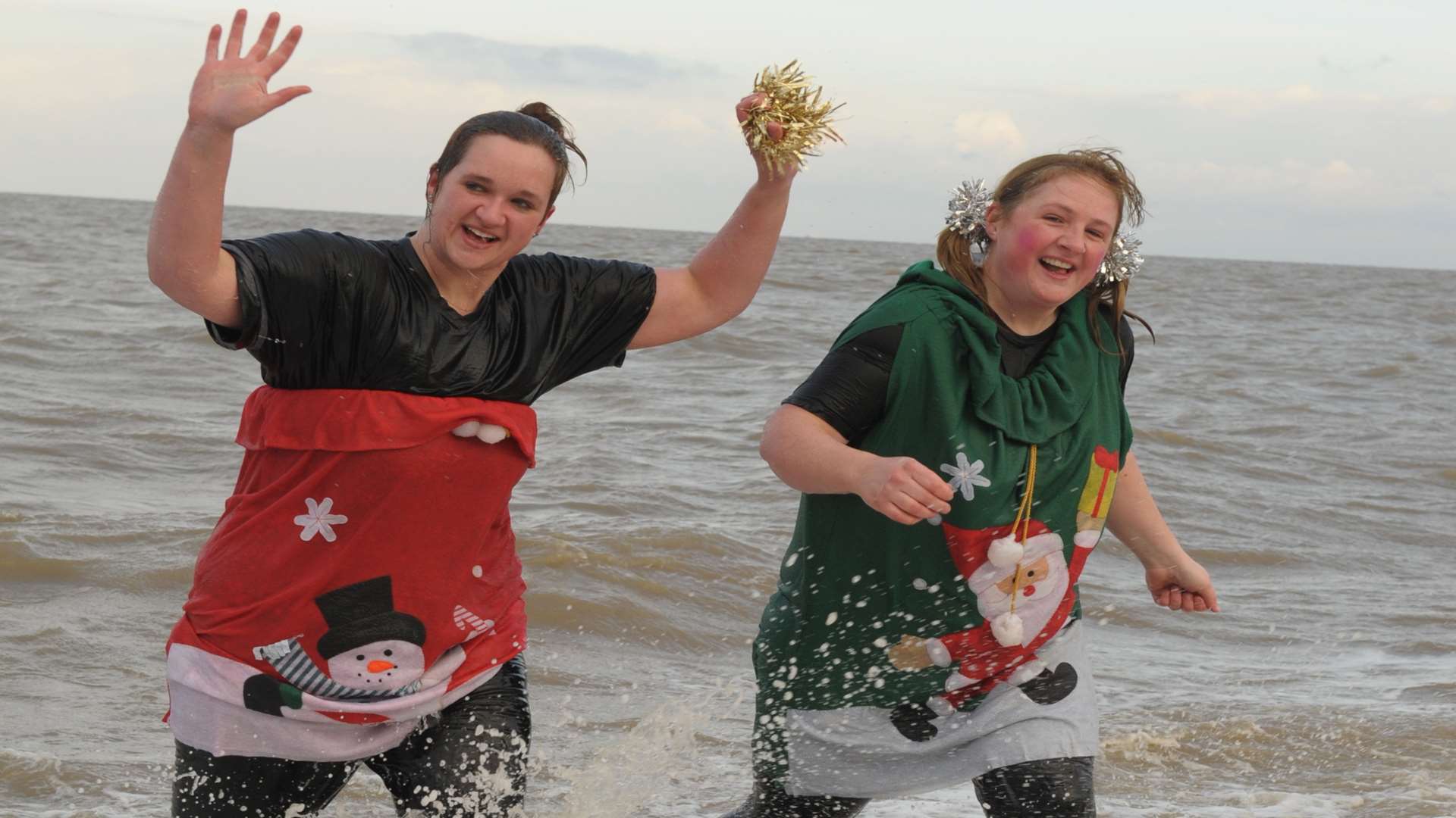 Jen Thornton and Claire Prescott emerge from the water.