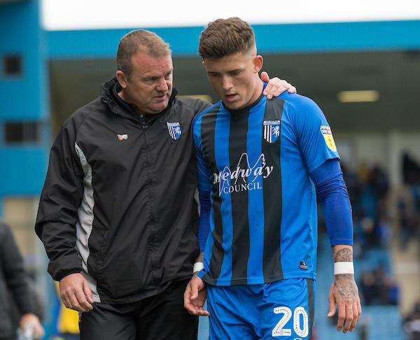 Gillingham's Darren Oldaker chats with assistant manager Mark Patterson after Bradford City win Picture: Ady Kerry (5143775)