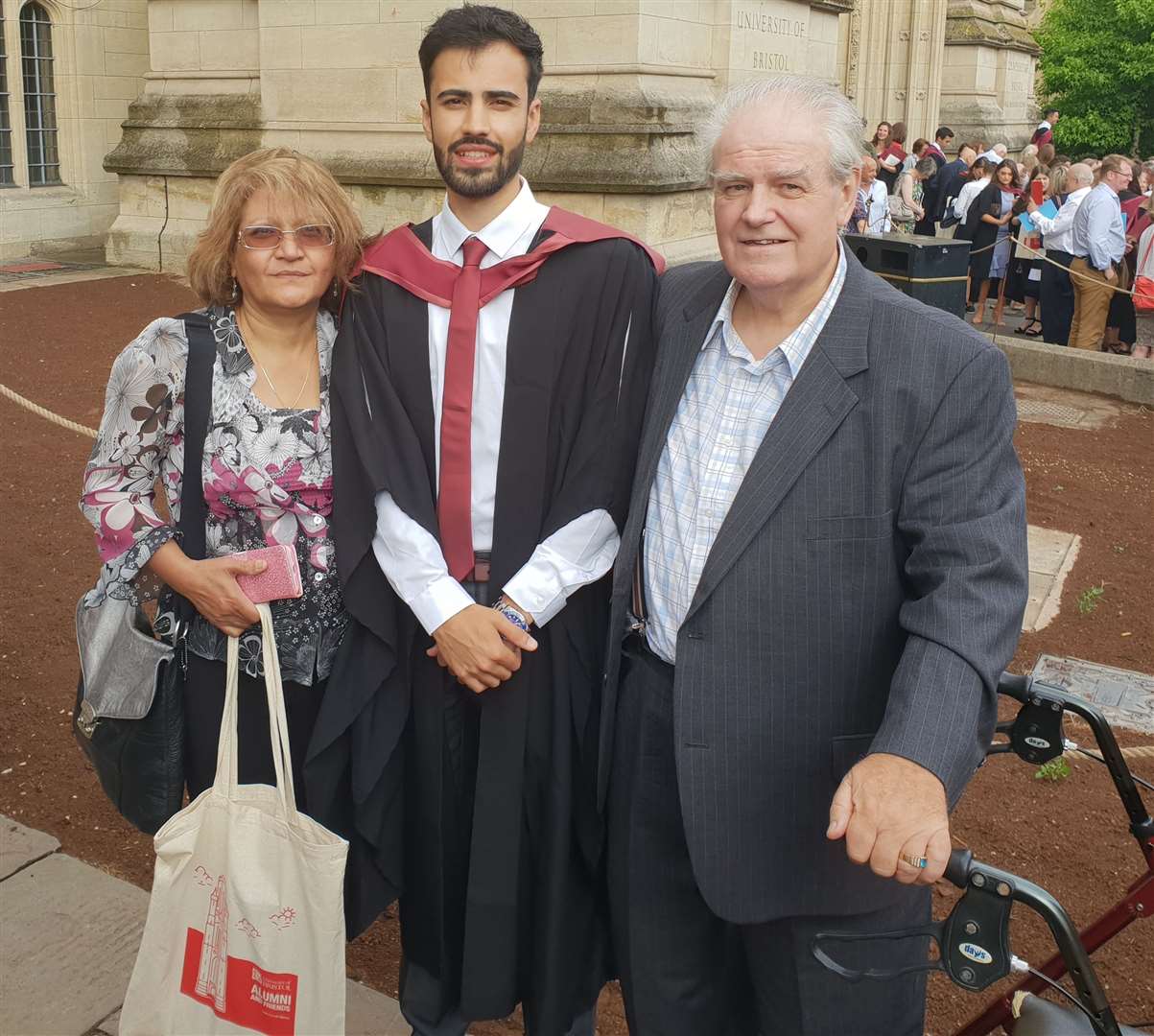 Tim Roberts with his parents (University of Bristol/PA)