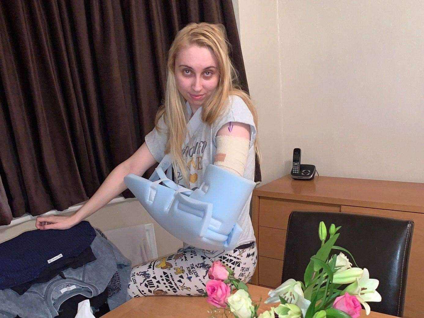 Danielle Jarrett, 27, from Dartford, has been left partially paralysed after an implant sunk too far into her body to be removed. Picture: SWNS