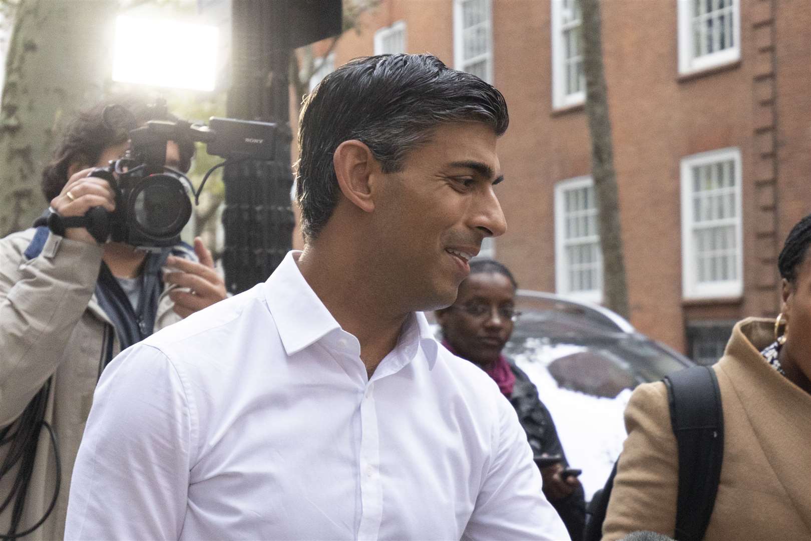 Rishi Sunak leaves his campaign office (Belinda Jiao/PA)