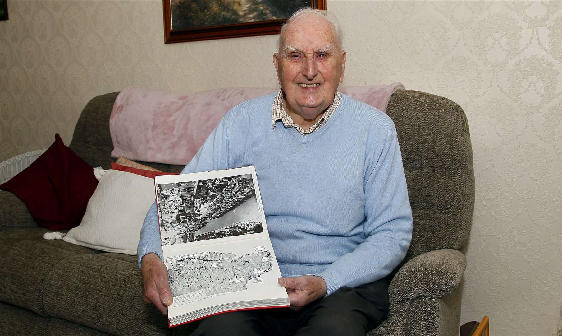 Alan Bignell has been sharing his doodlebug memories, pictured at his home in Barming, with a book showing the locations in Kent where they fell.Picture: Sean Aidan (10538031)