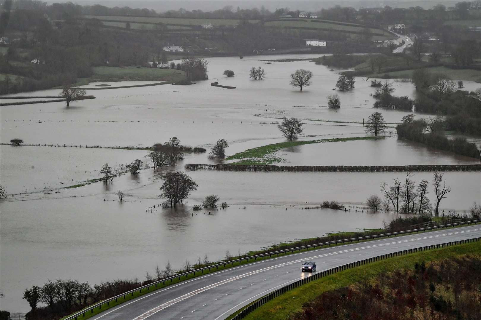 Flooded fields as the River Towy bursts its banks in Carmarthenshire on Friday (Ben Birchall/PA)