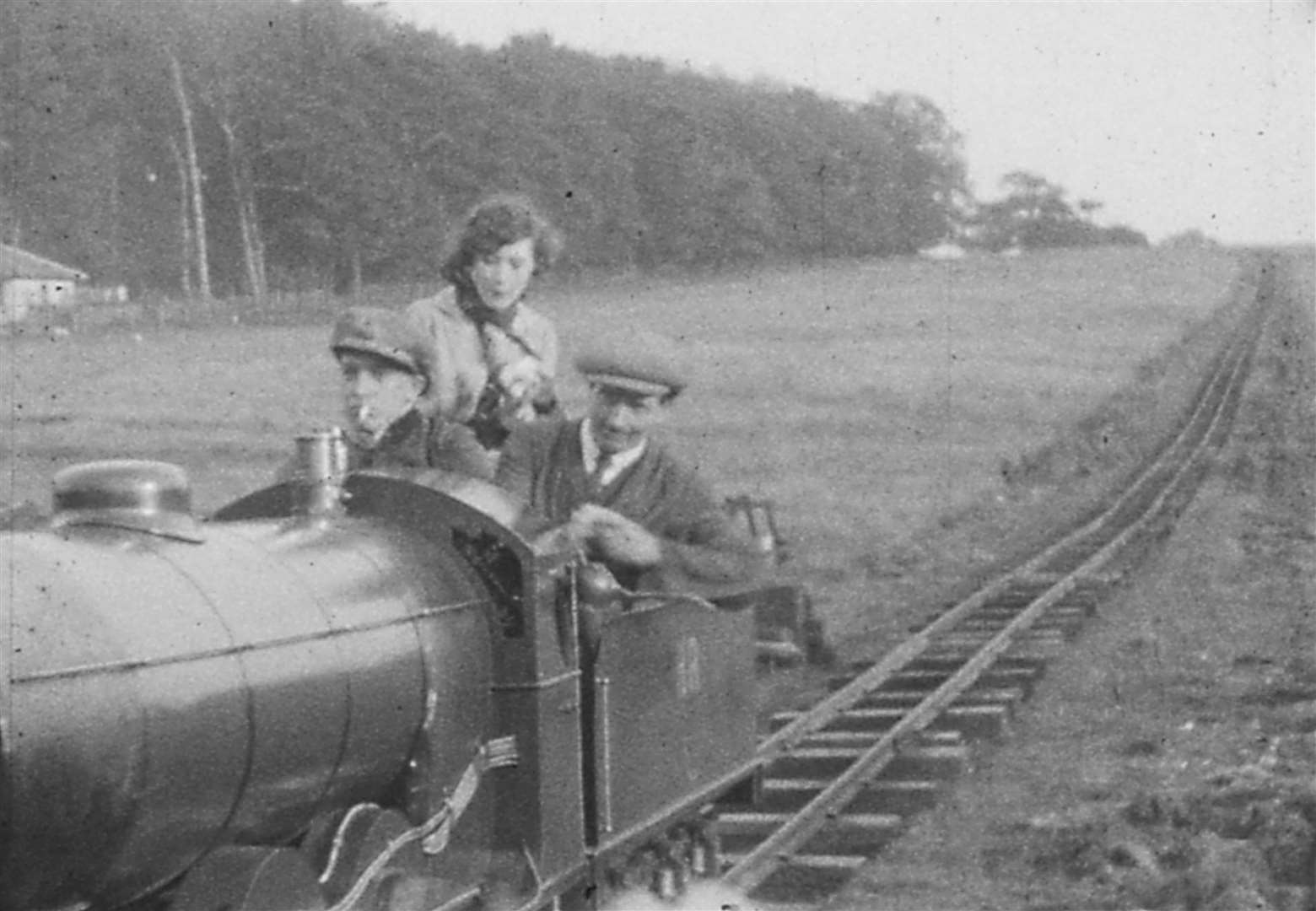 Count Zborowski (right) with Clive Gallop aboard a train on the mile-long track built around his Higham Park estate in Bridge.