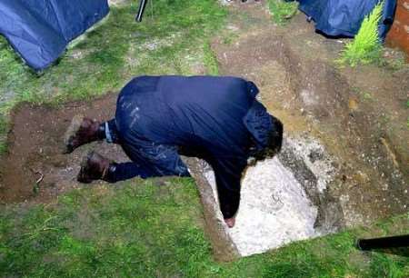 A forensic officer searches the garden at 50 Irvine Drive, Margate. Picture courtesy Kent News and Pictures/pool Essex Police