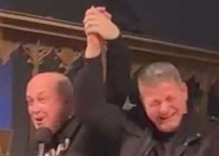 Vicar Nathan Ward crowns George Panai, 52, after he ate three mince pies in 32 seconds.