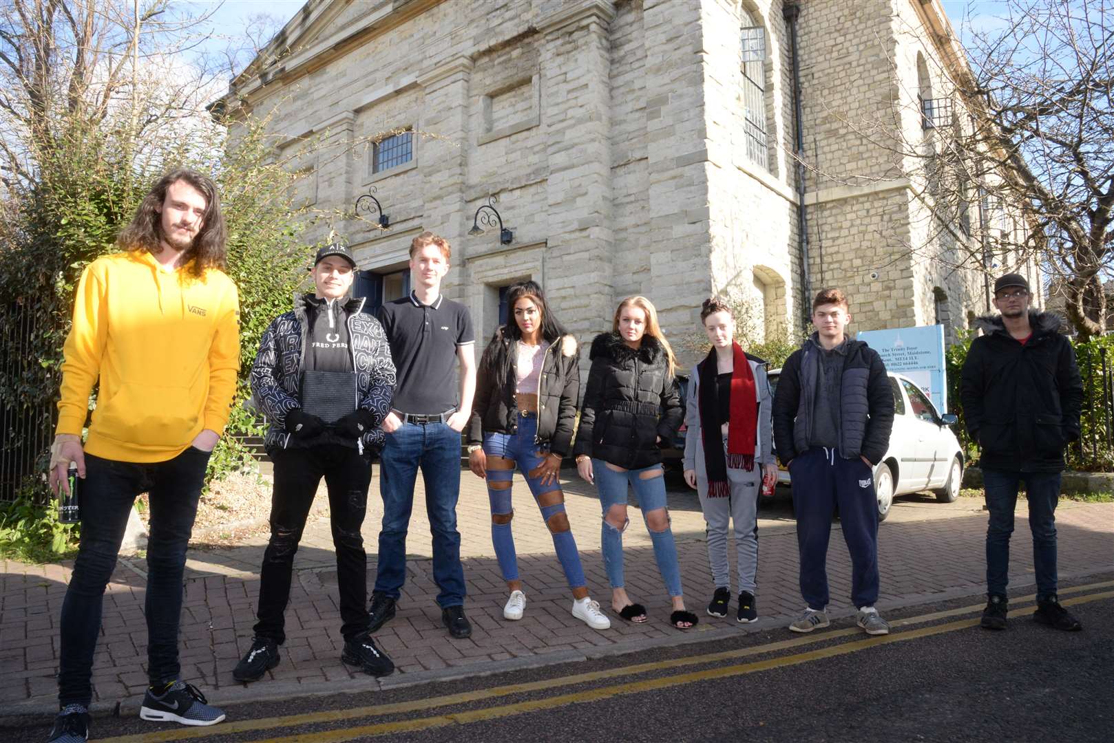 Ashley Jane and fellow residents outside the Trinity Foyer in Church Street, Maidstone. Picture: Chris Davey. (7293749)