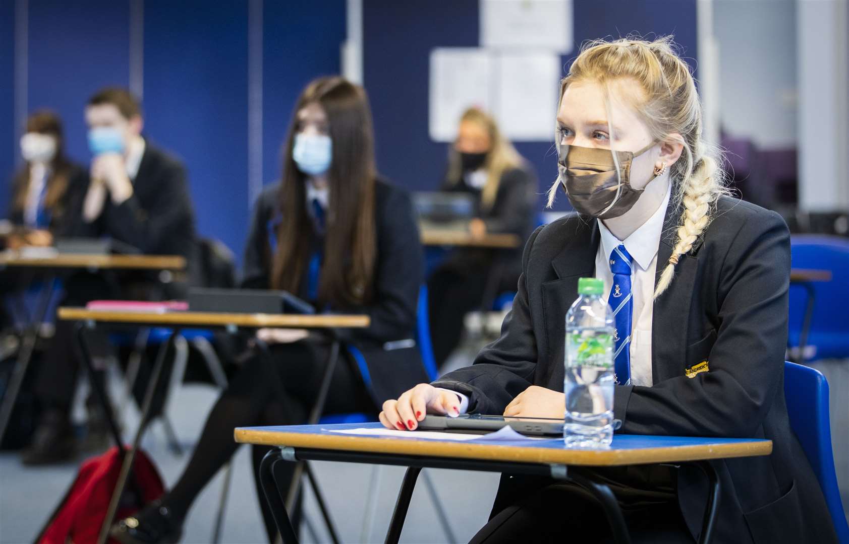 Secondary school pupils will have to continue wearing face coverings in classrooms for the first six weeks of term (Jane Barlow/PA)