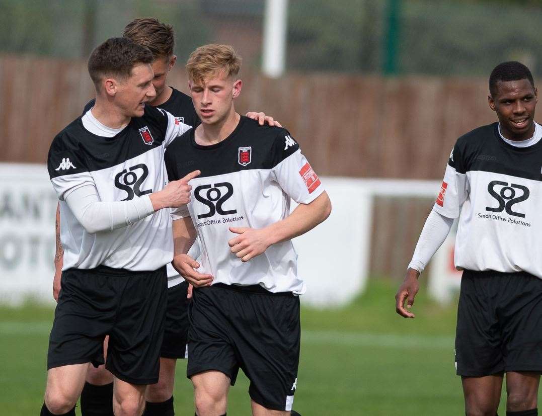 Ethan Smith, centre, makes it 1-1 and is congratulated by Sam Bewick. Picture: Ian Scammell