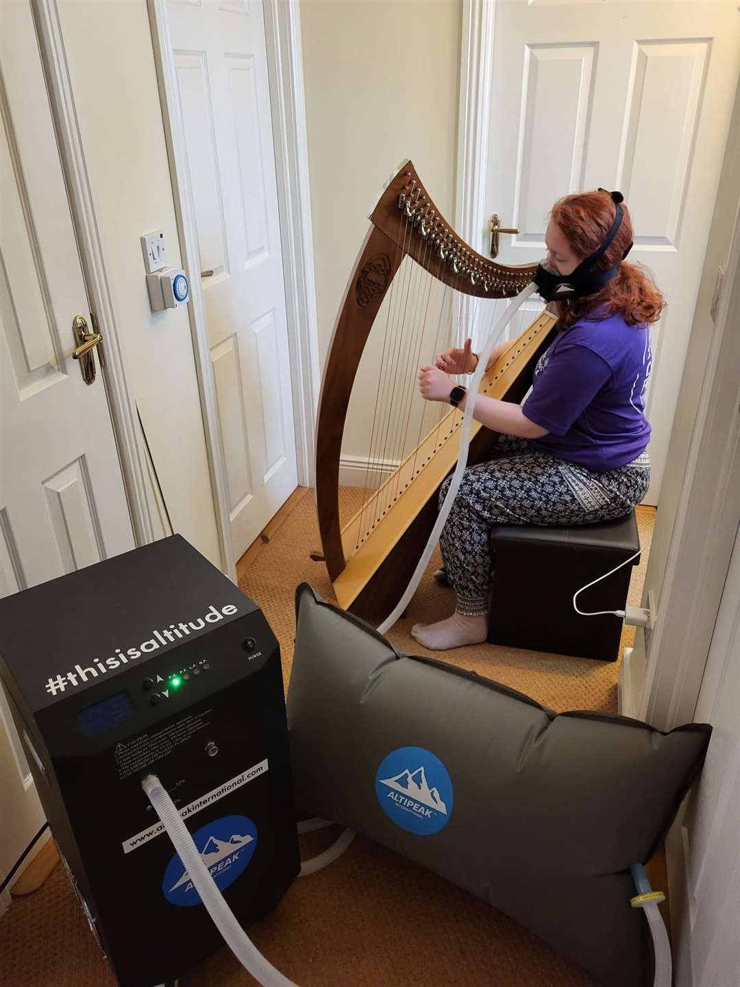 Siobhan using the Altipeak altitude machine (Stephen Lappin/PA)