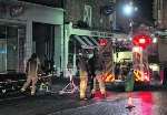 Firefighters outside the restaurant, pictured by Geoff Partner of Camera Craft