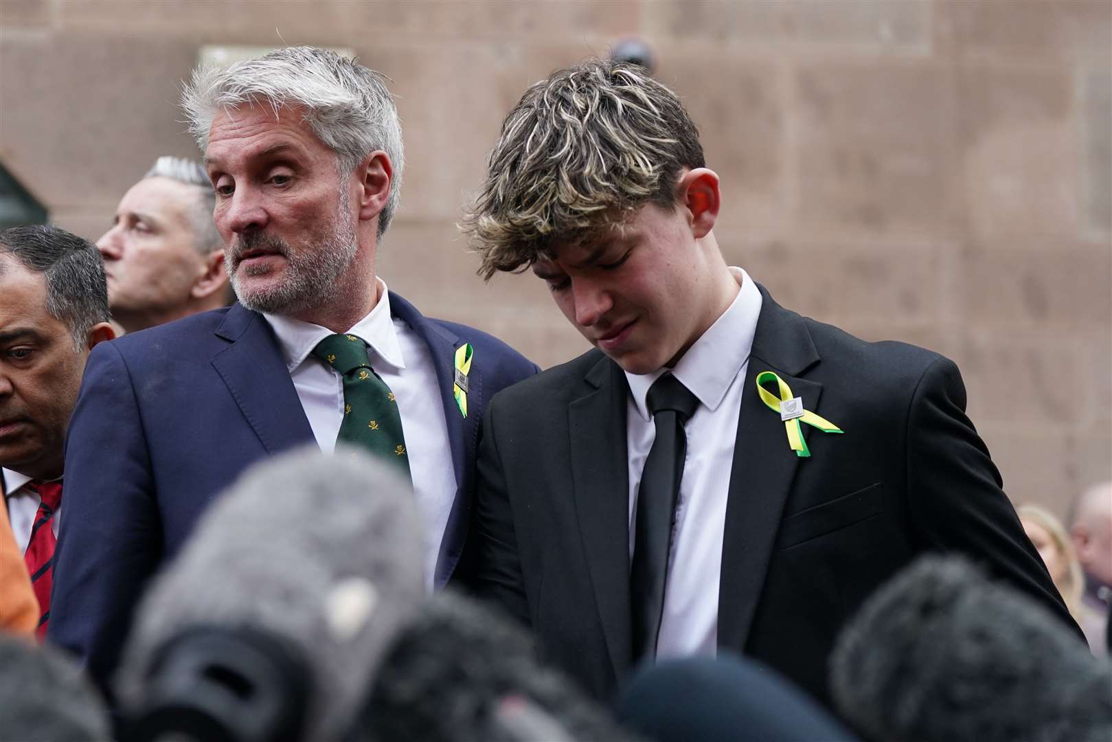 Barnaby Webber’s father and brother, David and Charlie Webber, after the sentencing (Jacob King/PA)