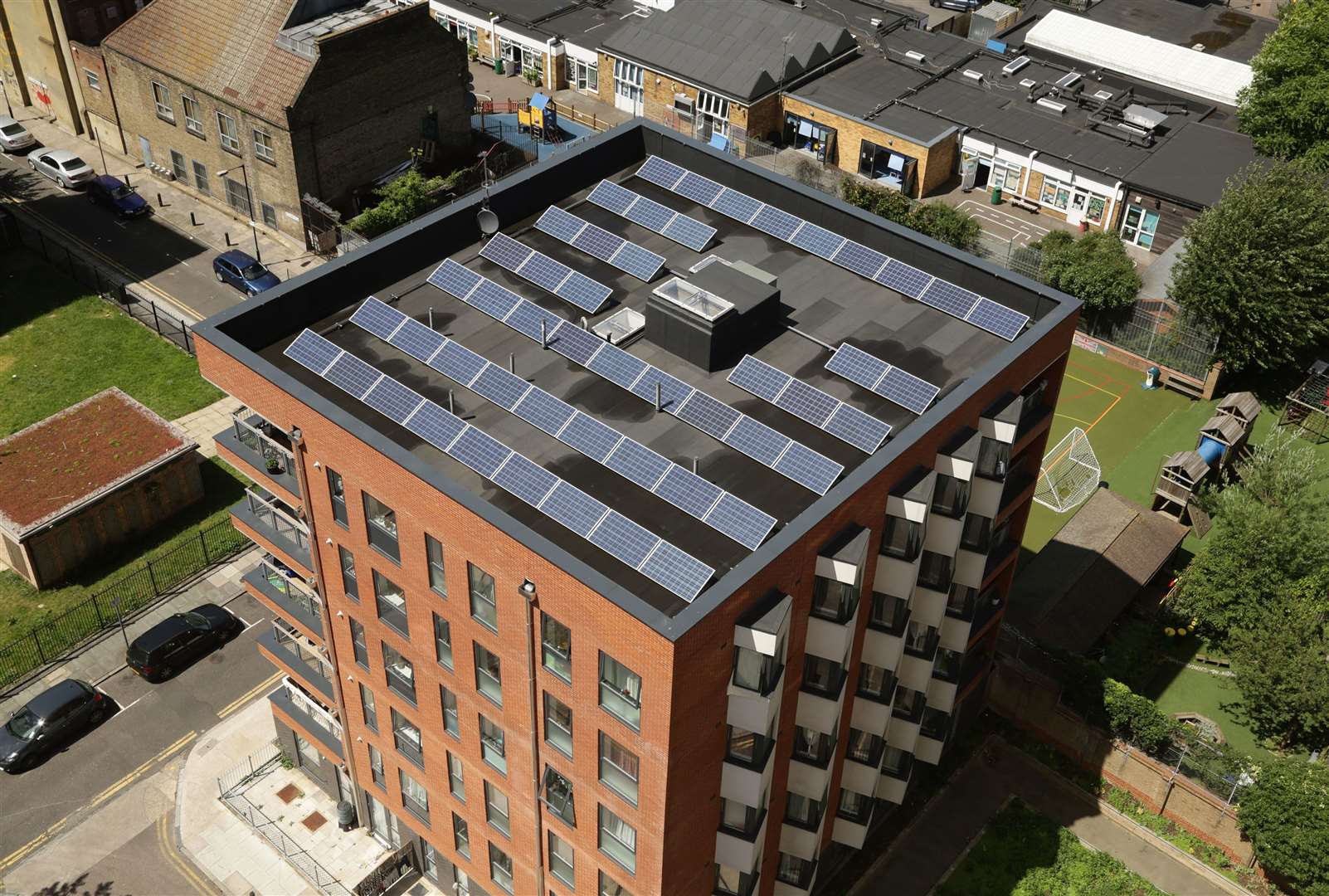 Solar panels on the roof of an apartment block in Bethnal Green, east London (Yui Mok/PA)