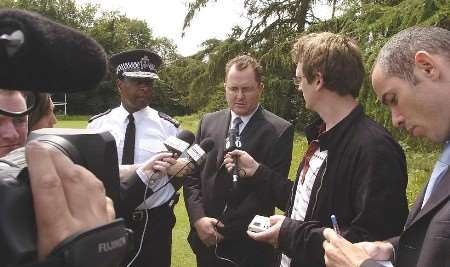 Chief Constable Mike Fuller and Det Supt Lee Catling, centre, answer media questions at the murder scene. Picture: ANDY PAYTON