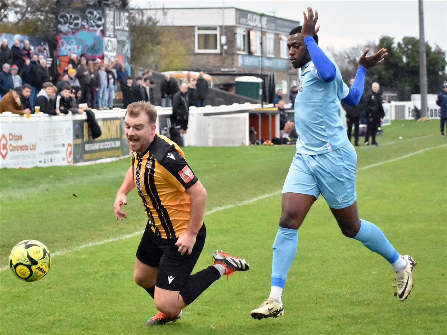 Midfielder Sam Blackman goes to ground for Folkestone. Picture: Randolph File