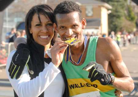 Ethiopian runner Yared Hagos with Dame Kelly Holmes after running a new course record
