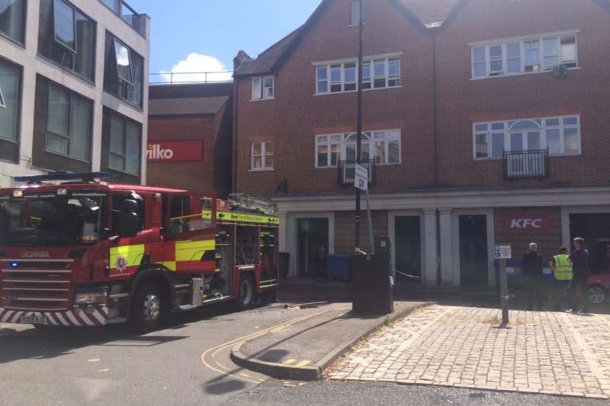 Fire engine at the rear of Burger King in Canterbury