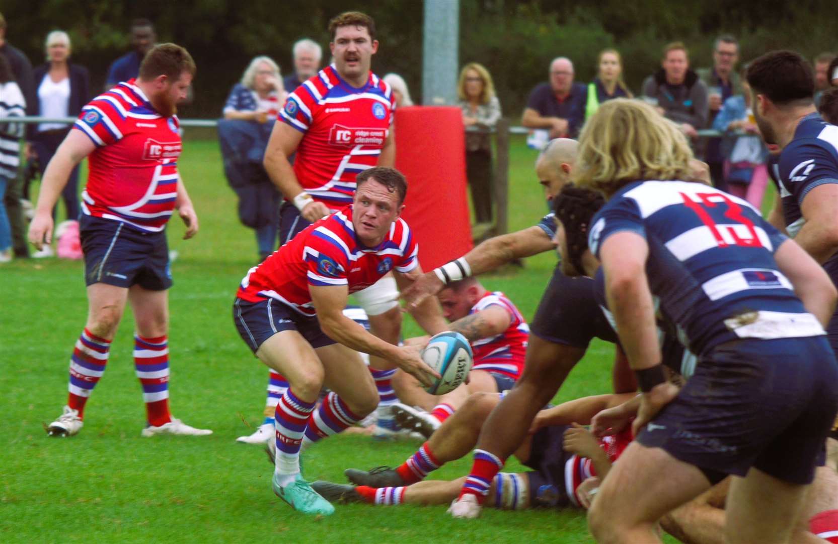 Matt Walsh looks for a team-mate during the win over Dorking. Picture: Adam Hookway