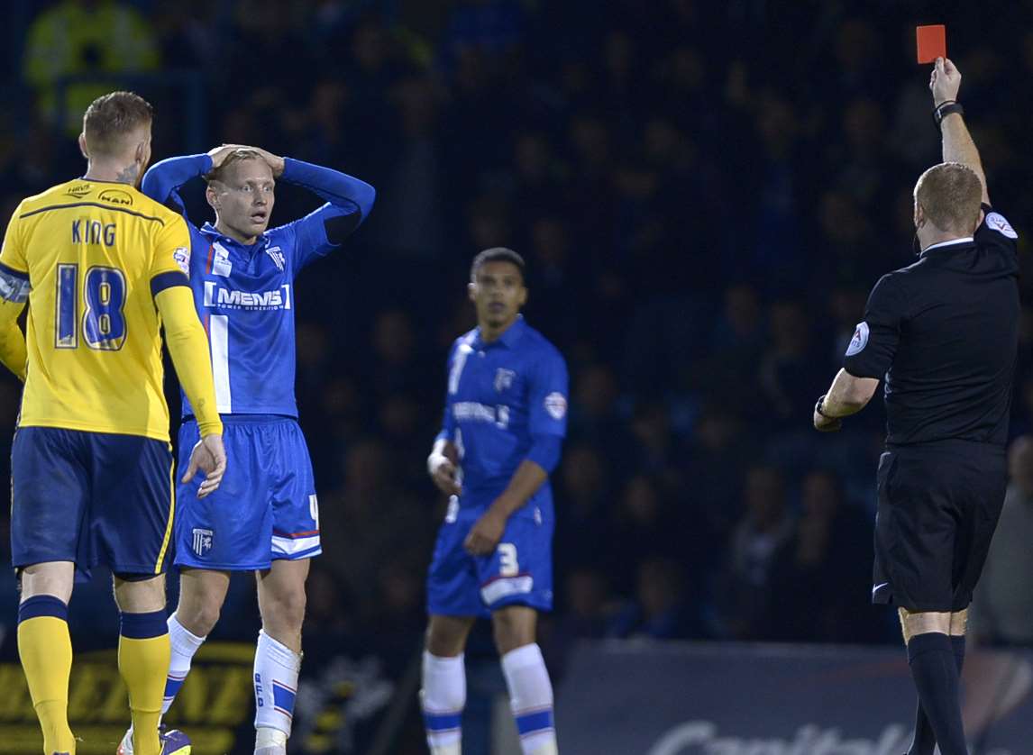 Josh Wright can't believe it. He is sent off by referee Lee Swabey. Picture: Barry Goodwin