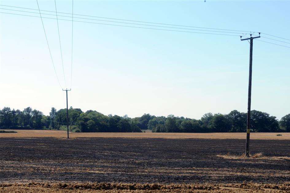 A field was left black and burnt after a fire by Dowle Street, Pluckley