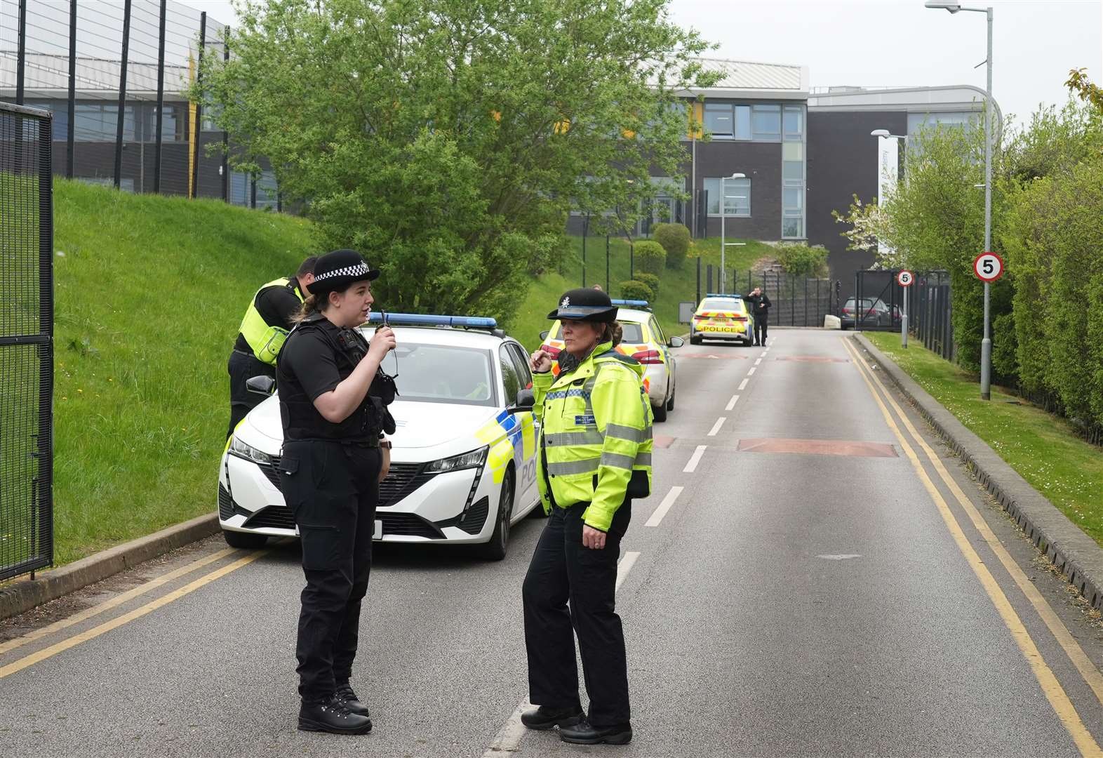 Police outside the Birley Academy in Sheffield, South Yorkshire, after Louis Melotte attacked a student and staff (Dominic Lipinski/PA)