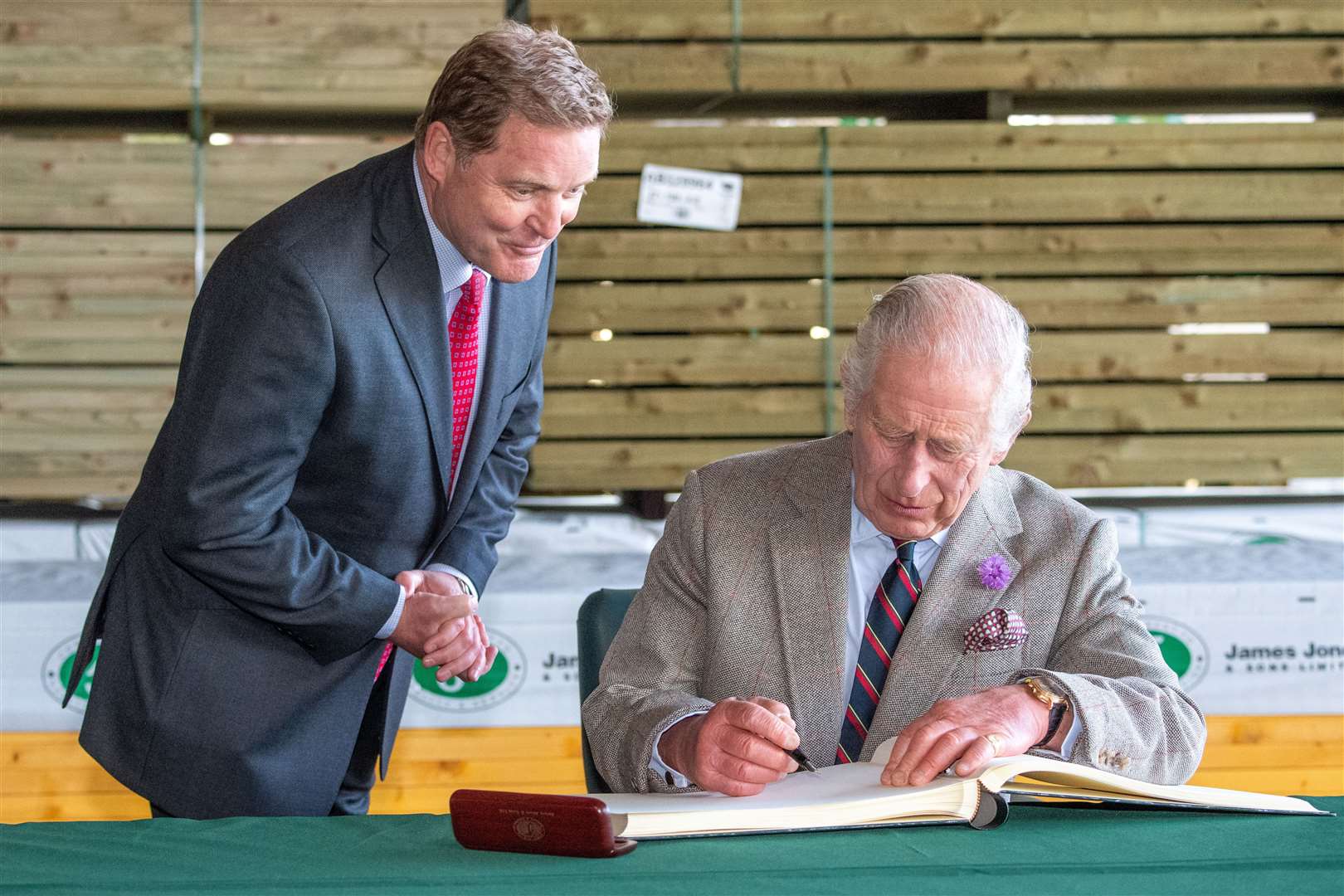 The King signed the visitor book (Kami Thomson/DC Thomson/PA)