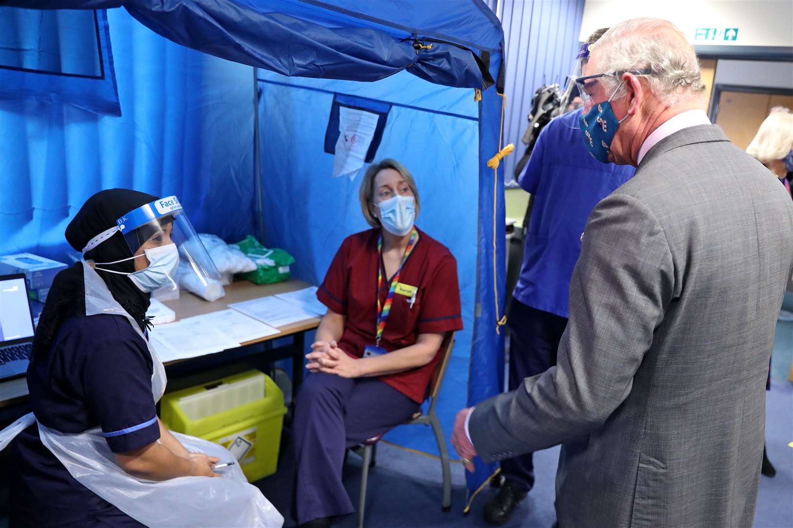 The Prince of Wales meets frontline health and care workers administering and receiving the Covid-19 vaccine (Chris Jackson/PA)