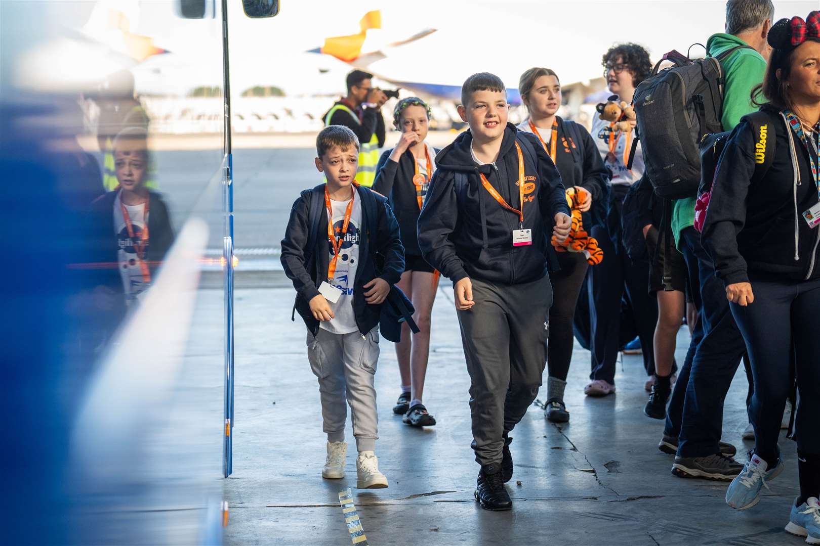 Freddy Gardiner, 12, from Gateshead (left) arrives for his flight (James Manning/PA)